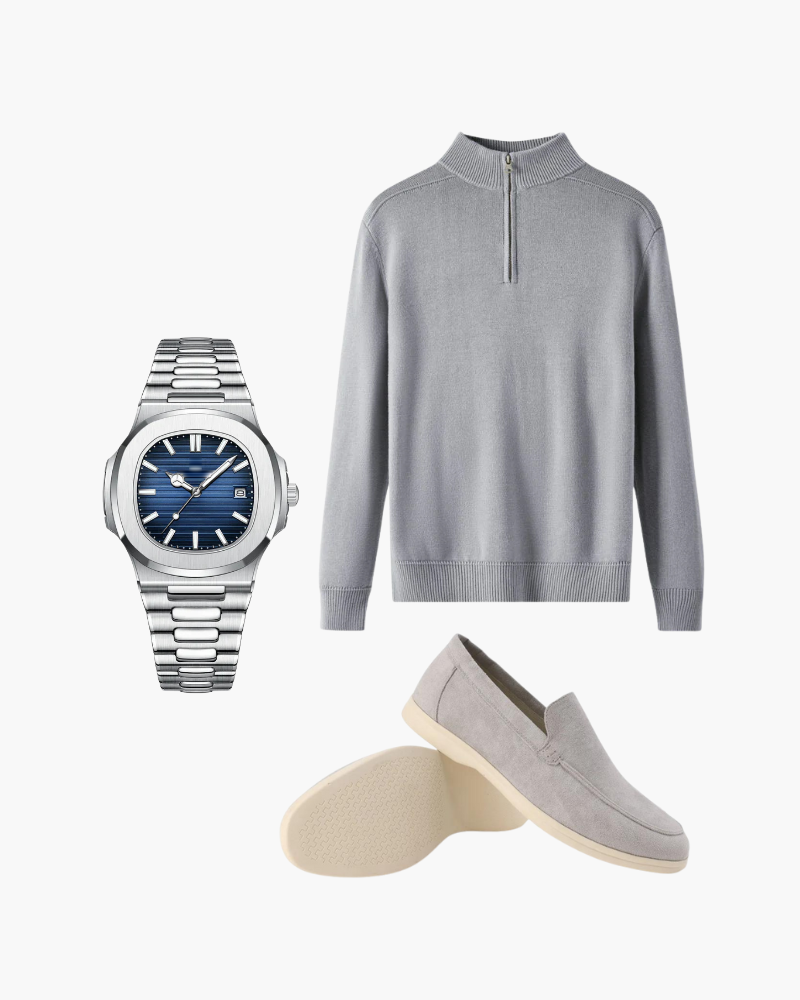 Grey quarter-zip jumper, steel watch with blue dial and grey suede loafers, flat-lay outfit set
