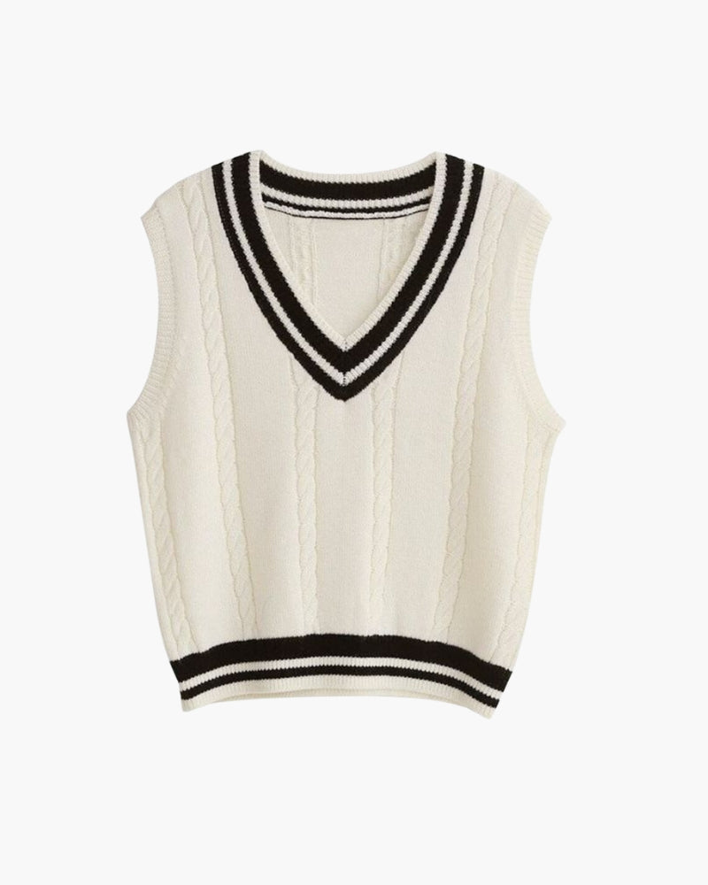 Cream cable-knit V-neck vest with black and cream striped trim, front flat-lay