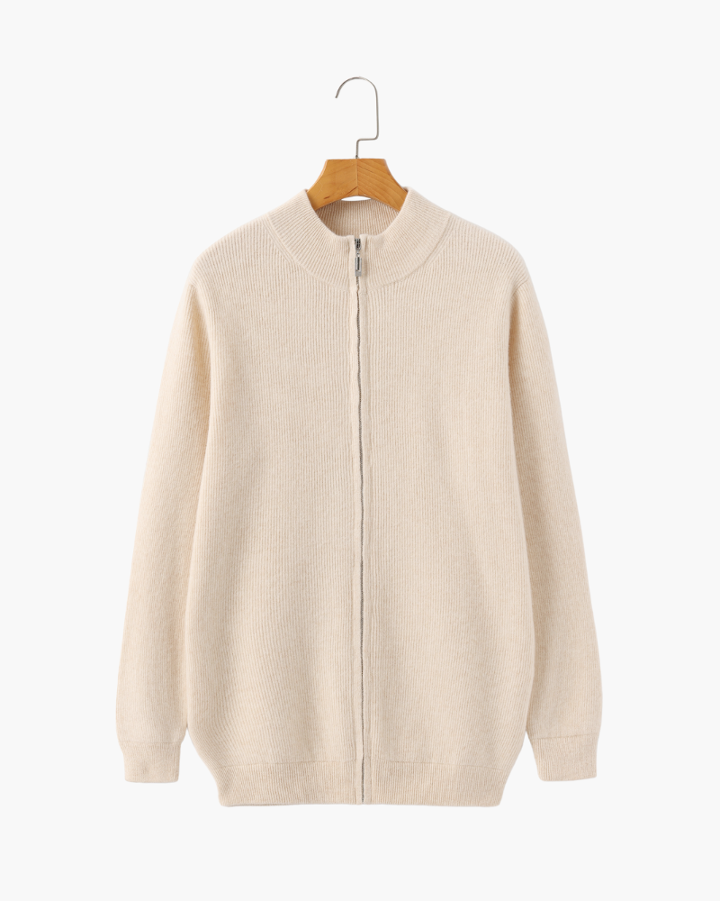 Cream ribbed zip-up jumper with stand collar on a hanger, flat front view