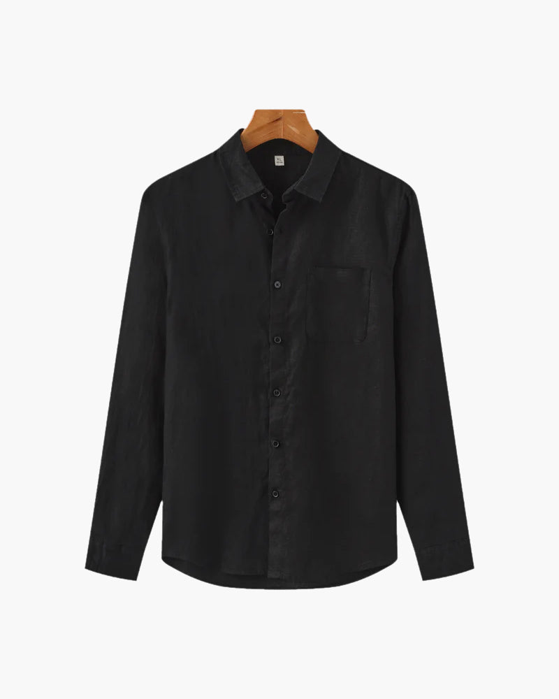 Black long-sleeve linen shirt with chest pocket and button front on a hanger, front view