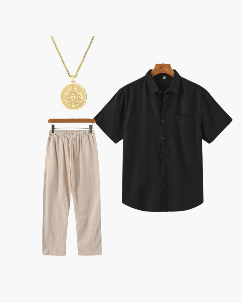 Lookbook-Flatlay: schwarzes Kurzarm-Leinenhemd, beige Hose mit Kordelzug und goldene Medusa-Anhängerkette