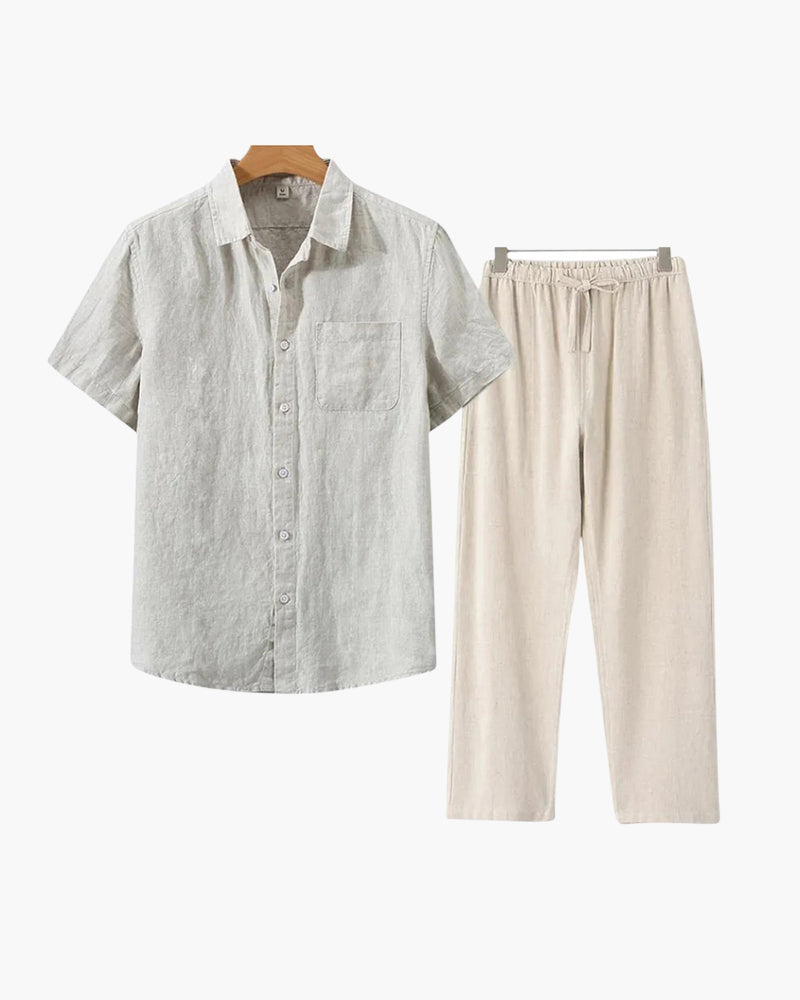 Graubeiges Kurzarm-Leinenhemd mit Brusttasche und cremefarbene Hose mit Kordelzug, flach gelegtes Set