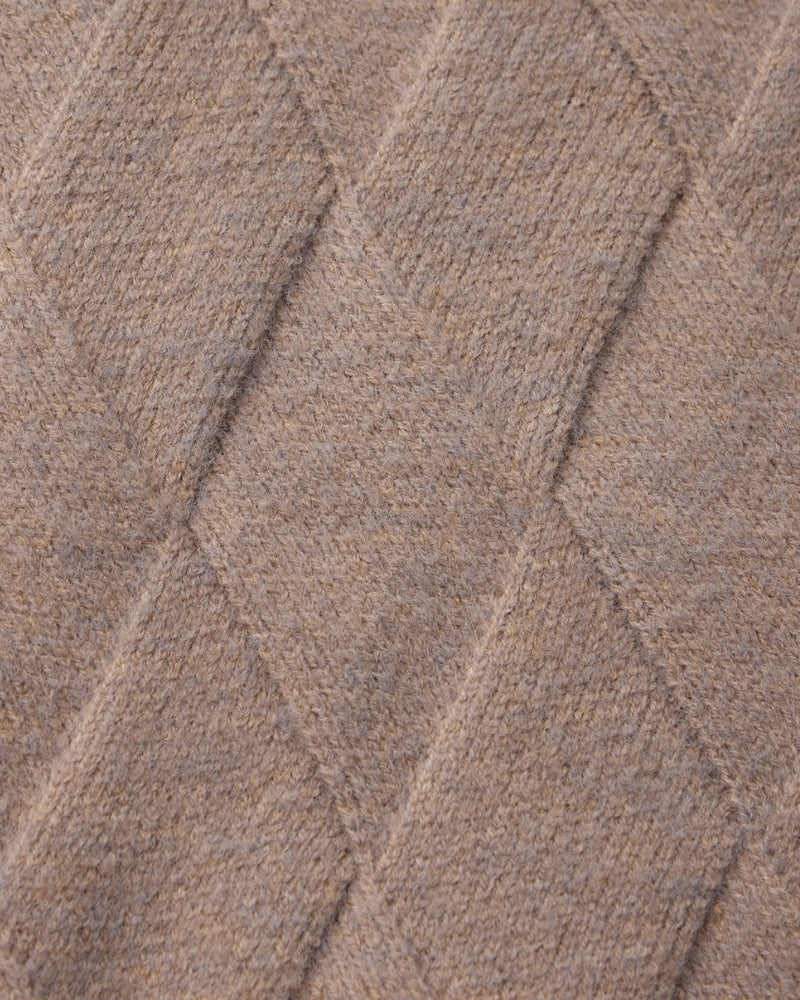 Primer plano de la textura de punto de rombos topo – Chaqueta de punto de rombos con cremallera para hombre