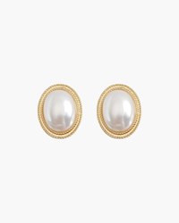 Pair of oval pearl stud earrings with gold-tone twisted rope border, front view on white