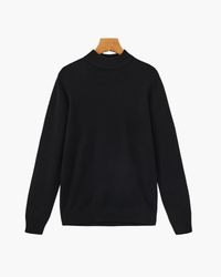 Black ribbed mock neck jumper, front flat-lay on wooden hanger