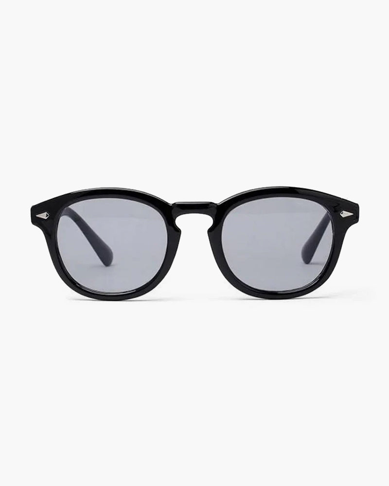 Lunettes de soleil rondes à monture noire et verres gris, vue de face