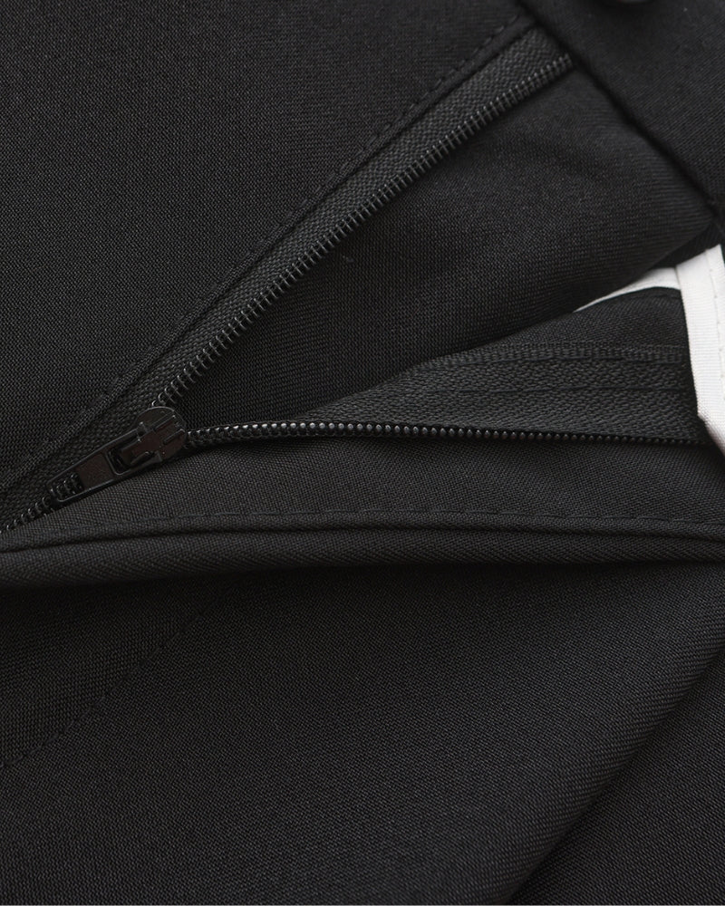 Close-up of black trousers zip fly and waistband lining – Men's Wide-Fit Trousers