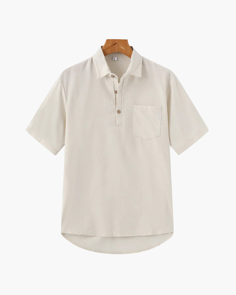 Cream short-sleeve linen polo shirt with chest pocket and wooden buttons on a hanger, front view