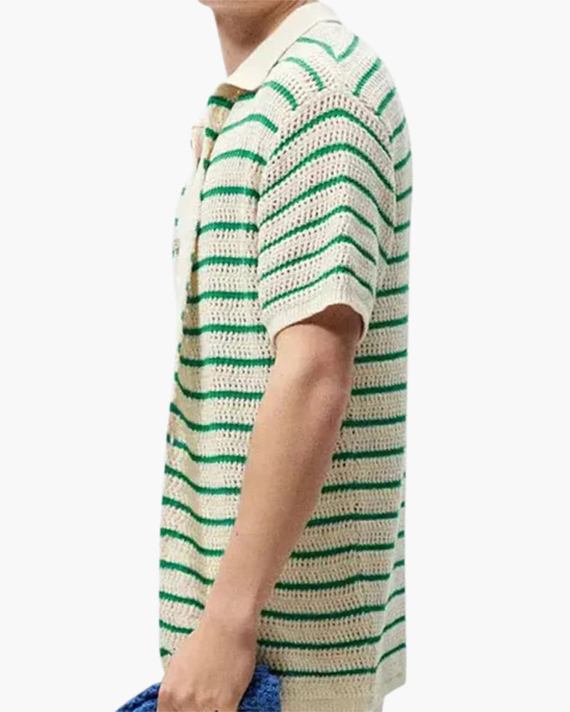Side view of man in cream open-knit shirt with green stripes and short sleeves