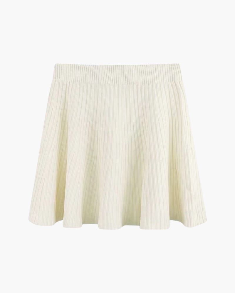 Cream knitted pleated mini skirt with ribbed waistband, flat-lay front view