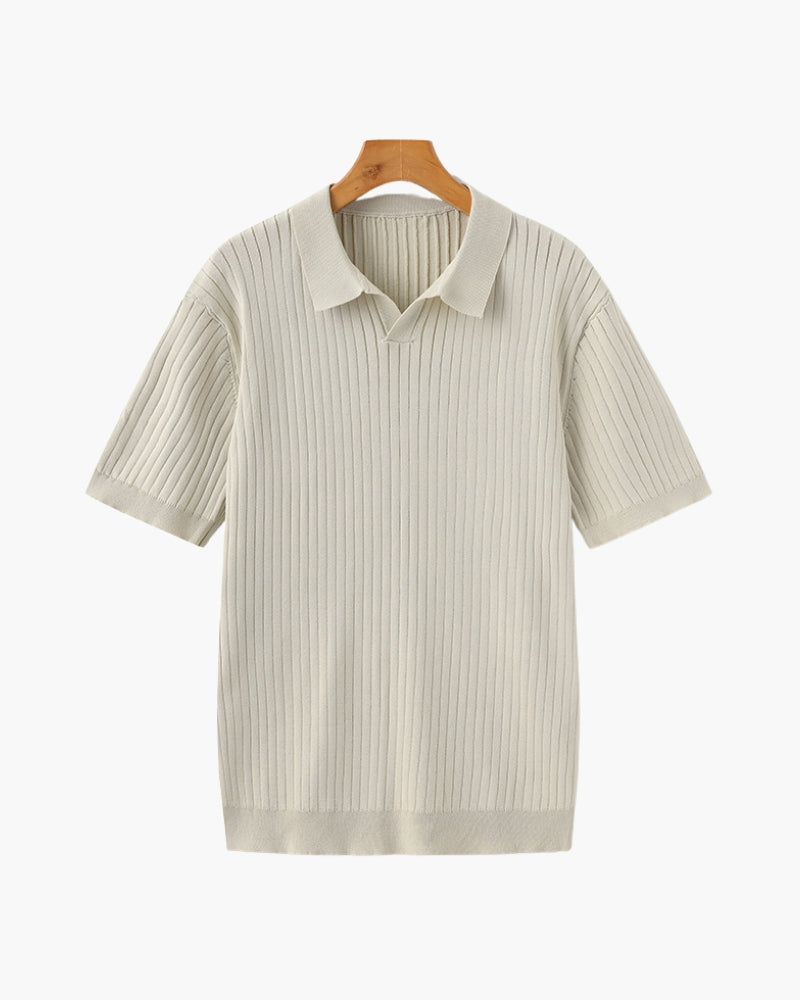 Cream ribbed knit short-sleeve polo with open Johnny collar, front view on a wooden hanger