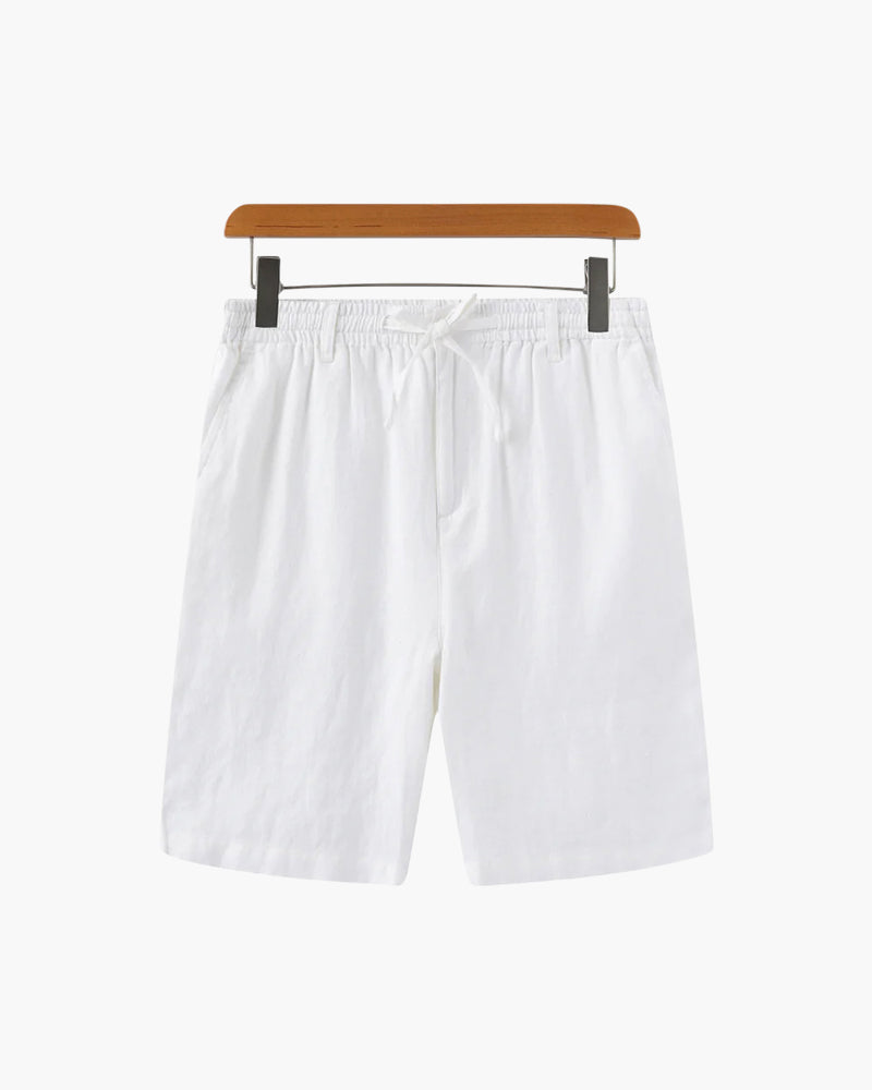 White linen drawstring shorts on a wooden hanger, flat front view