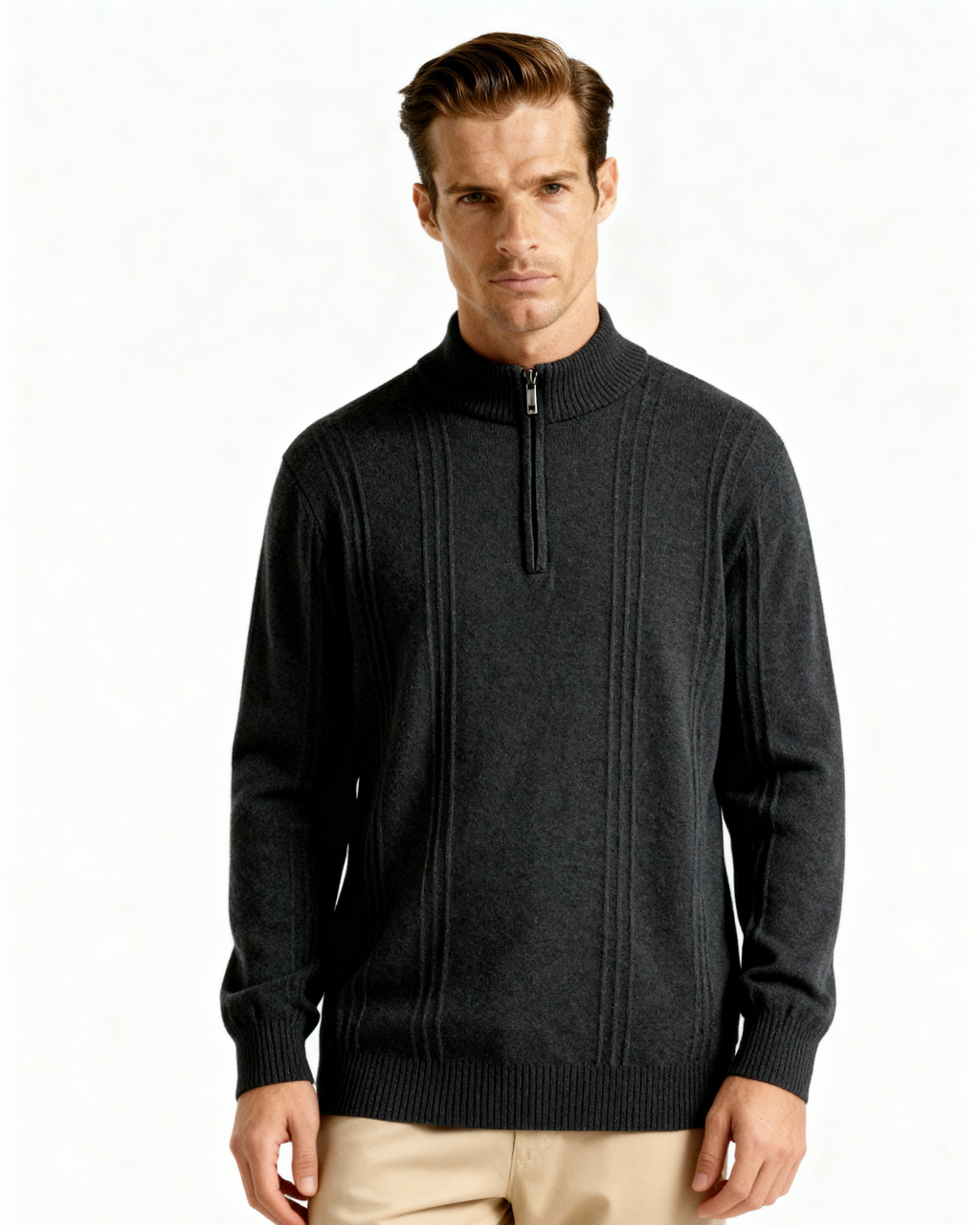 Front view of a charcoal cashmere half-zip jumper with ribbed panels and beige trousers, on model