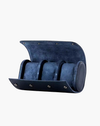 Navy suede-lined leather watch roll case open to show three cushions