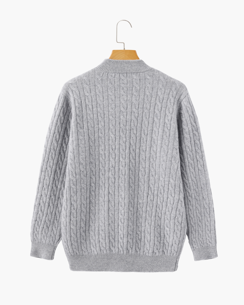 Back of a light grey cable-knit cashmere half-zip jumper on a hanger