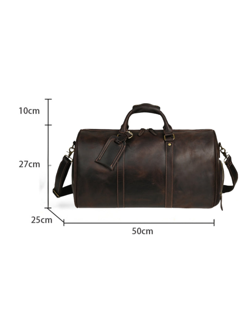 Dark brown leather duffle bag with luggage tag, marked 50cm long, 27cm tall and 25cm deep