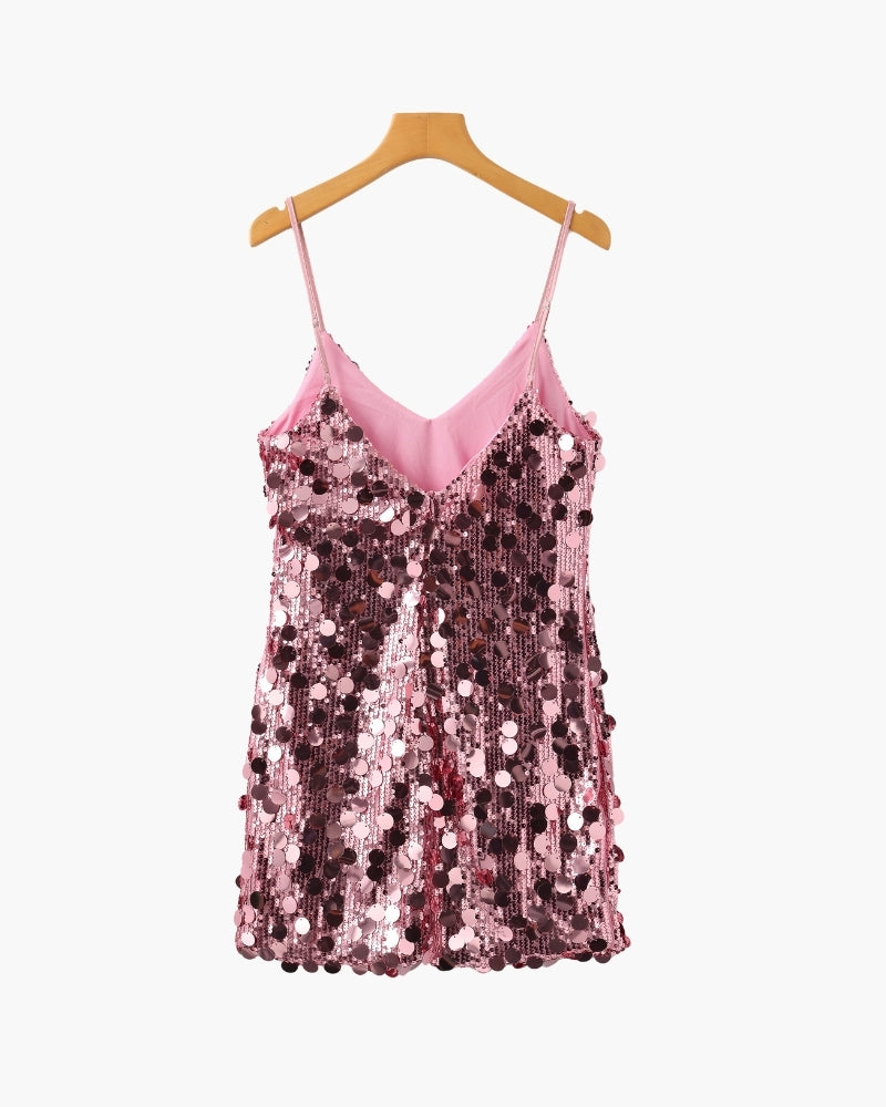 Back view of pink paillette sequin mini slip dress with pink satin lining, on a wooden hanger