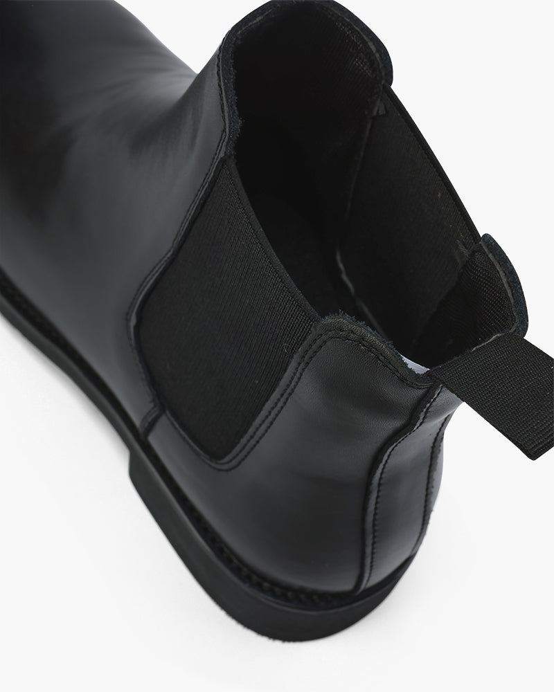 Close-up of black Chelsea boot elastic side panel and heel – Men's Suede Chelsea Boots