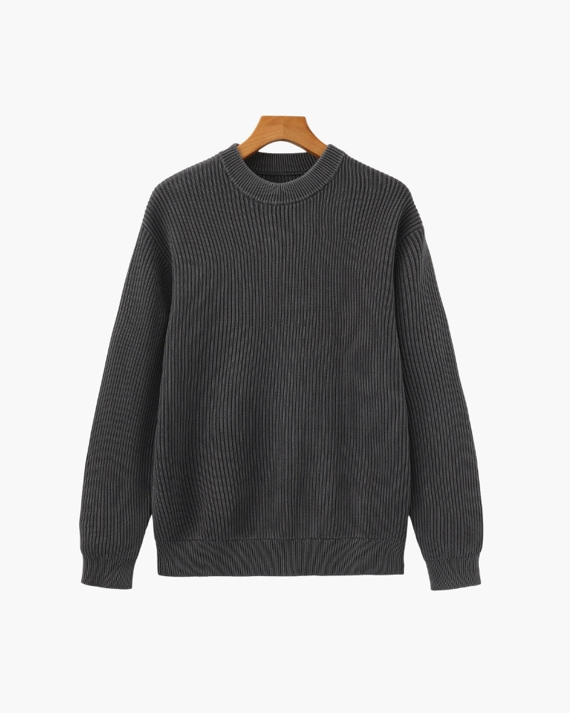 Charcoal-grey washed chunky rib-knit crew-neck jumper, front view on a wooden hanger