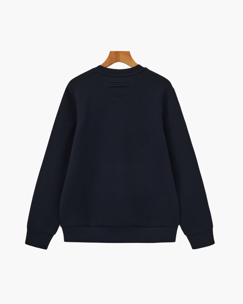 Dos d'un sweat col rond en modal-coton bleu marine sur cintre, ourlet côtelé
