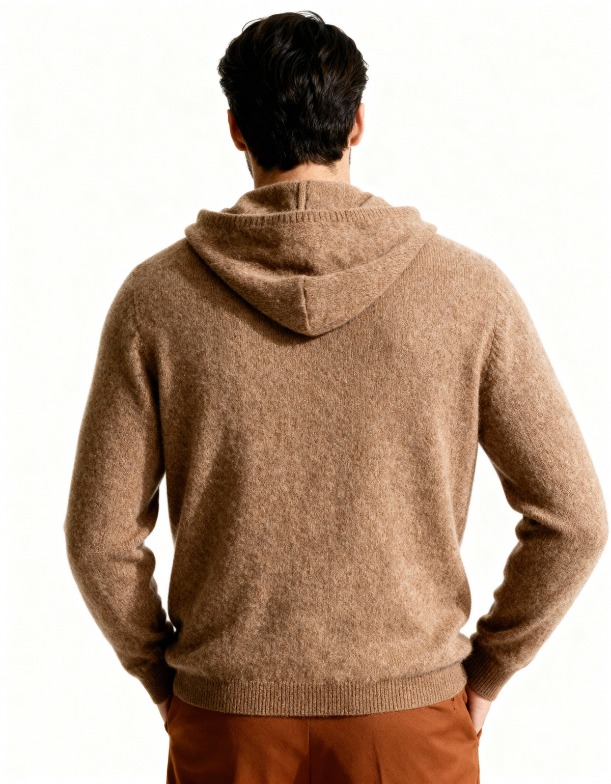 Back view of a brown cashmere hoodie showing the hood and ribbed hem, on model