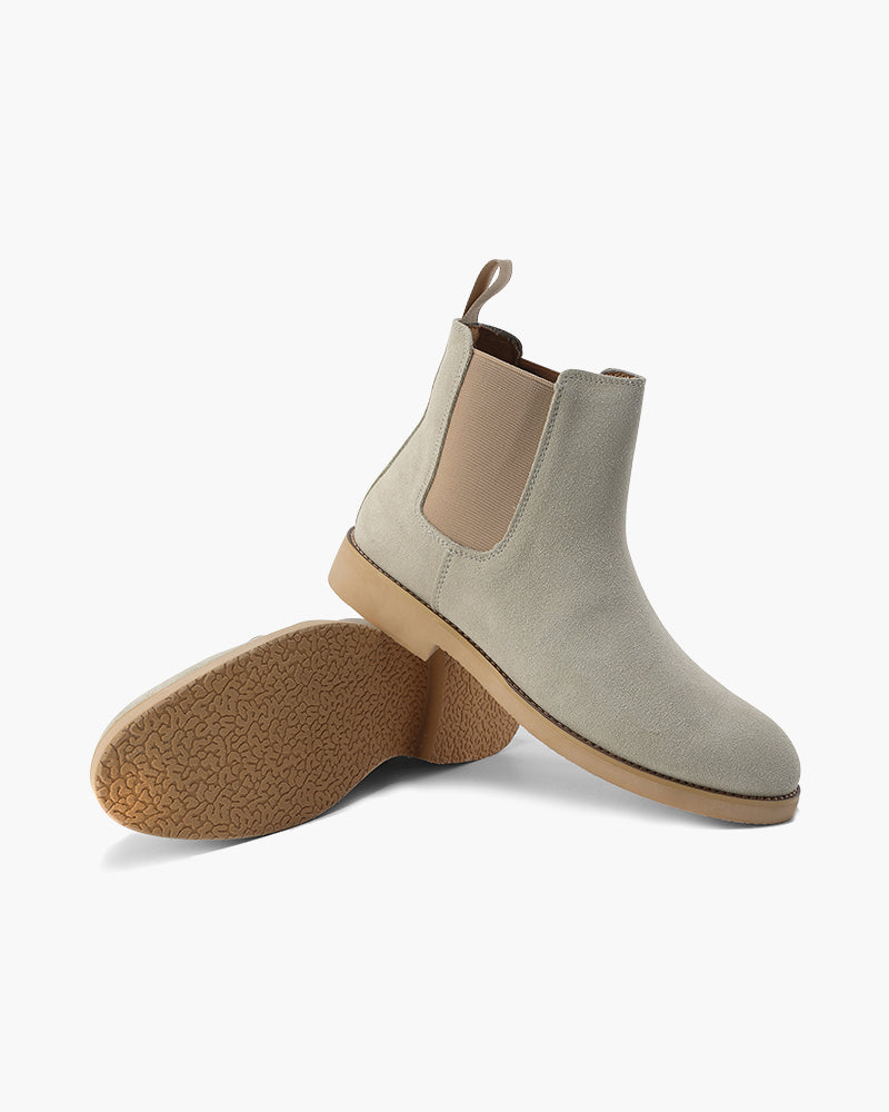 Stone grey suede Chelsea boot with the crepe sole turned beside it