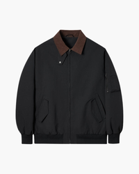 Black harrington jacket with brown corduroy collar, zip front and sleeve pocket, flat front view
