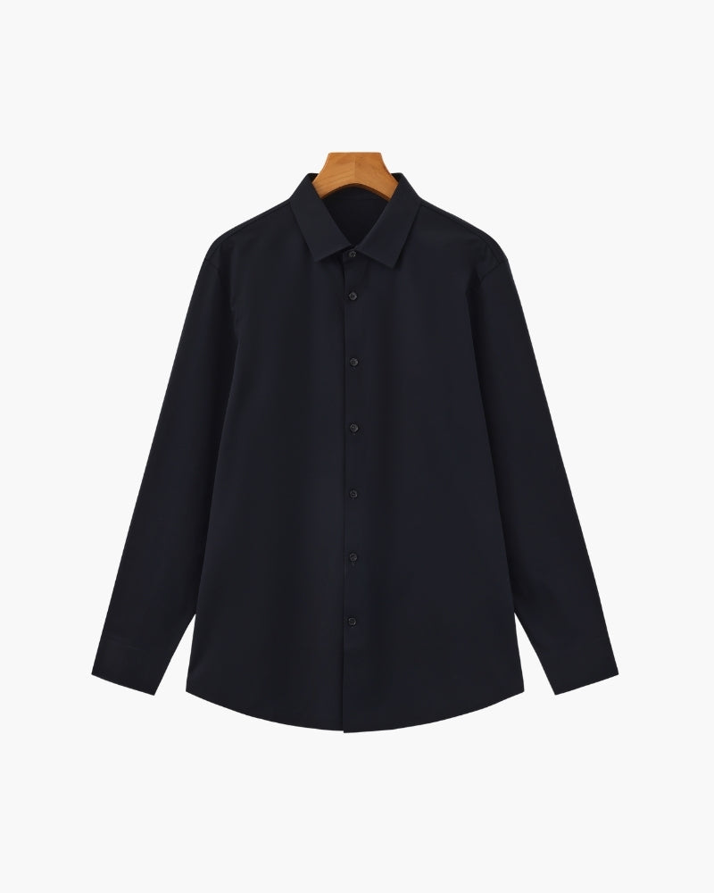 Navy long-sleeve shirt with pointed collar and dark buttons on a wooden hanger, flat front view