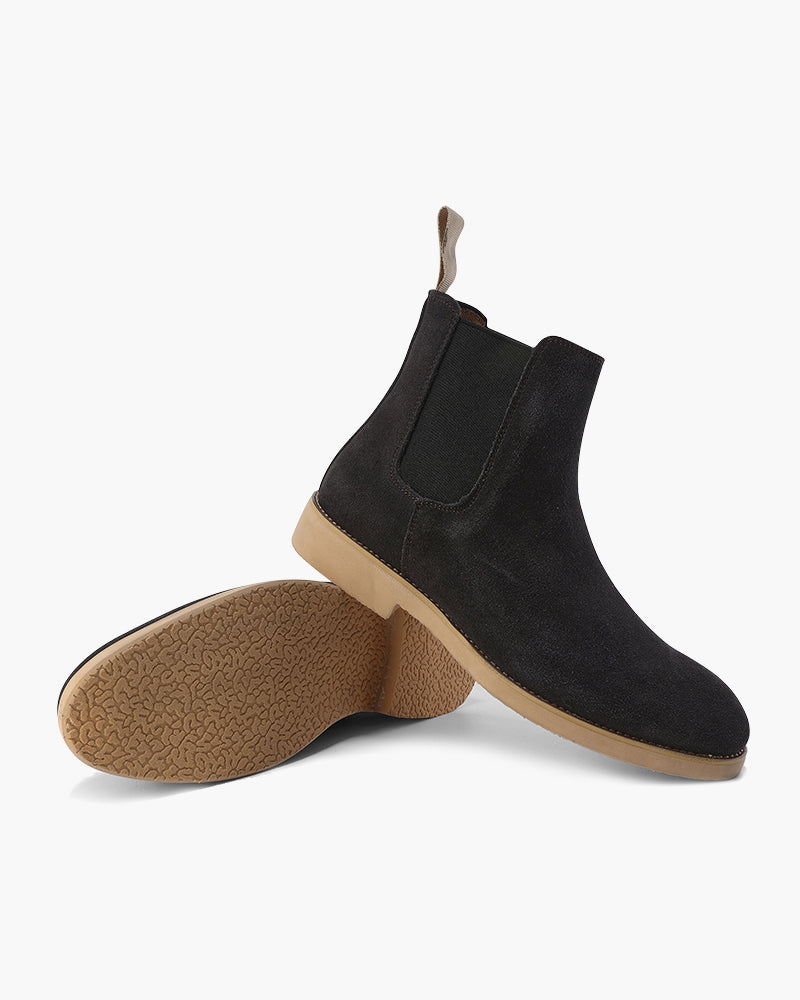 Charcoal suede Chelsea boot with the crepe sole turned beside it